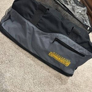 Black and Gray Duffel Bag Commanders